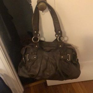 Brown leather bag with silver hardware